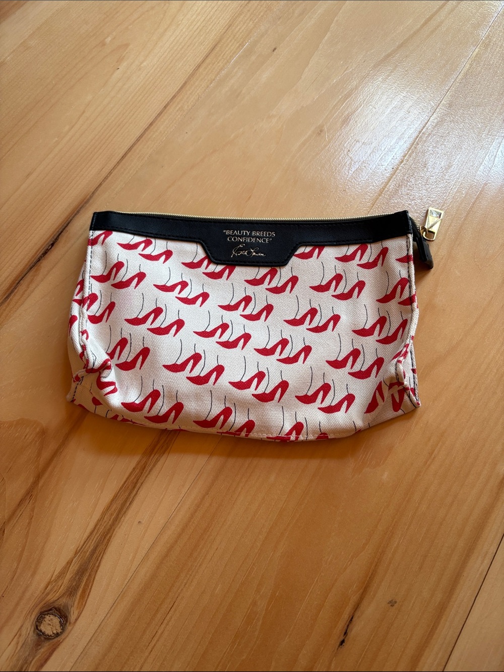 Estee Lauder Cream Cosmetic Pouch with Red Shoe Print